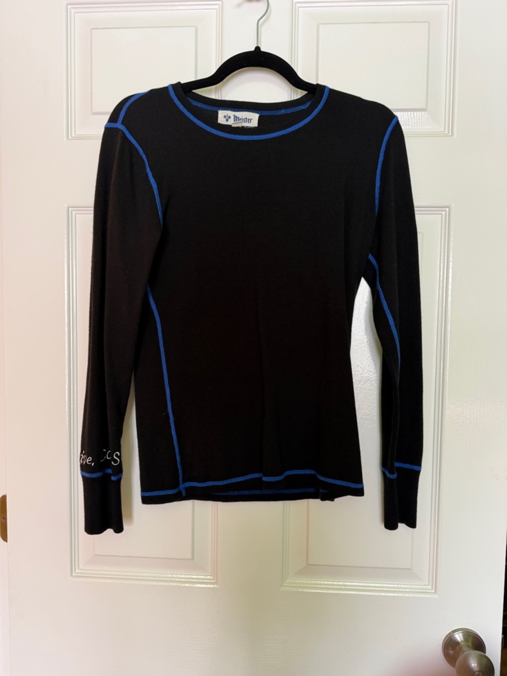 Women’s Meister Black Long Sleeve Ski Sweater L but fits more like a S.
